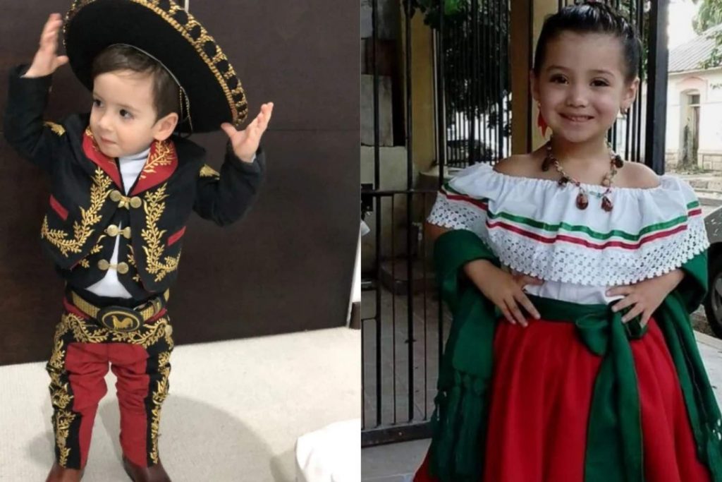 Un niño vestido con un elegante traje de charro y una niña con un vestido de china poblana. La nota celebra los trajes típicos de México.